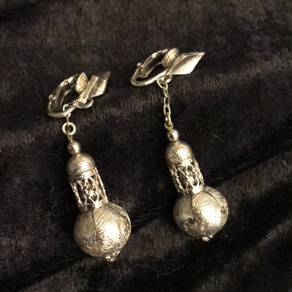 Silver dangle clip on earrings
